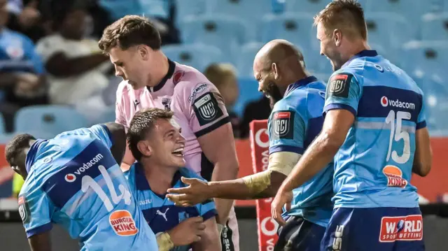 Elrigh Louw of the Vodacom Bulls celebrates after scoring a try