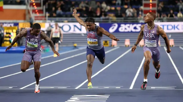 Trayvon Bromell, Jeremiah Azu, and Jordan Anthony cross the line