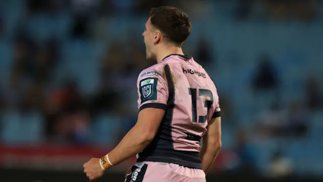 Harri Millard celebrates his try