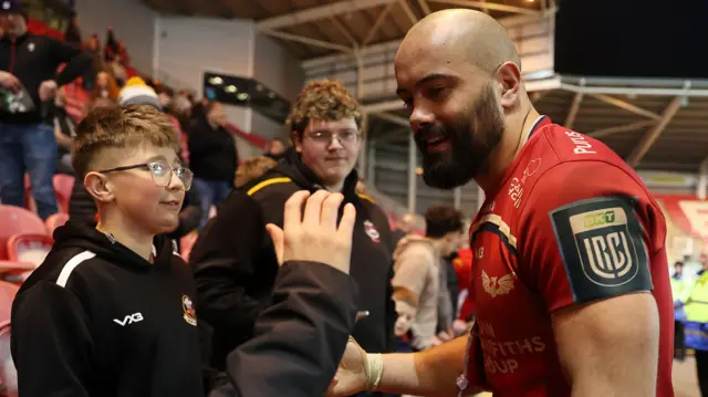 Josh Macleod chats to fans after the game
