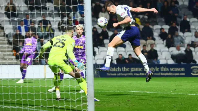 Milutin Osmajic heads Preston's second goal of the game against Stoke