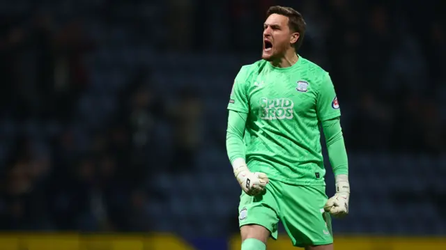 Preston goalkeeper Daniel Iverson shouts in celebration