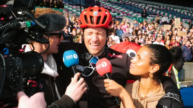 Greg in tears at the finish line