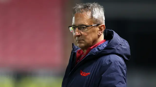 Nigel Davies looks on