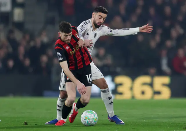 Manchester United's Bruno Fernandes in action with AFC Bournemouth's Ryan Christie