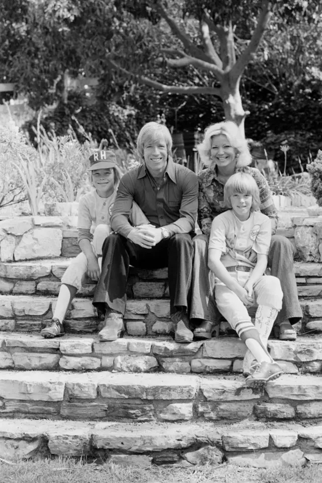 Chuck Norris with his wife Diane and their sons Mike and Eric