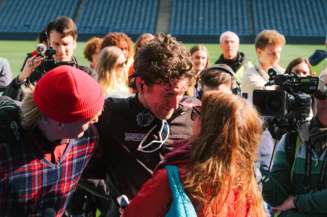 Greg with wife Bella Mackie at the finish line