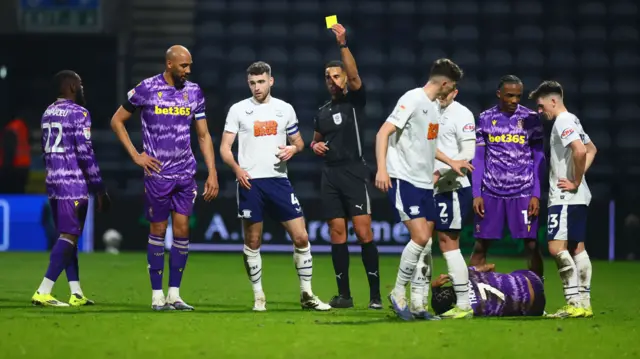 Ben Whiteman receives a yellow card after his foul on Sorba Thomas