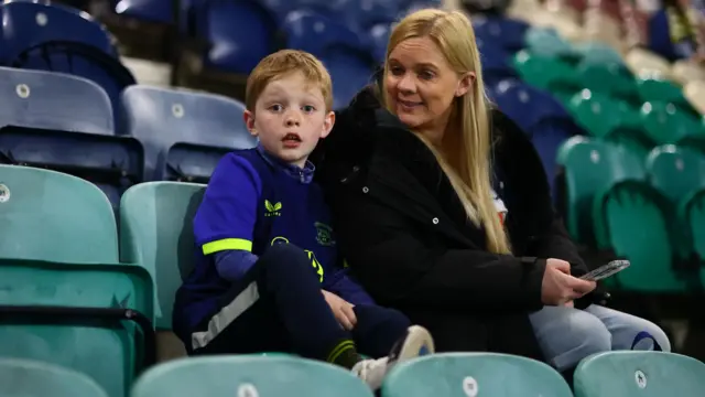 A young Preston fan sat in the stands at Deepdale