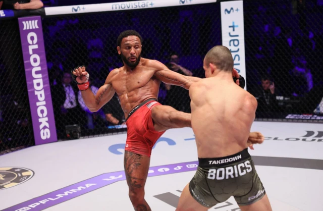 Adam Borics is kicked by AJ McKee