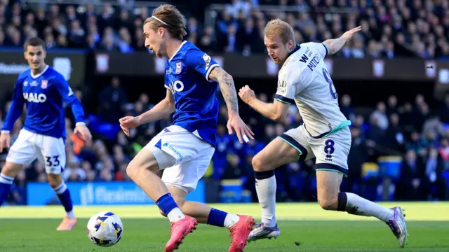 Jack Clarke running with the ball for Ipswich against Millwall