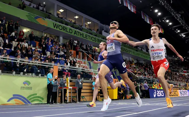 Josh Kerr celebrates as he crosses the finish line