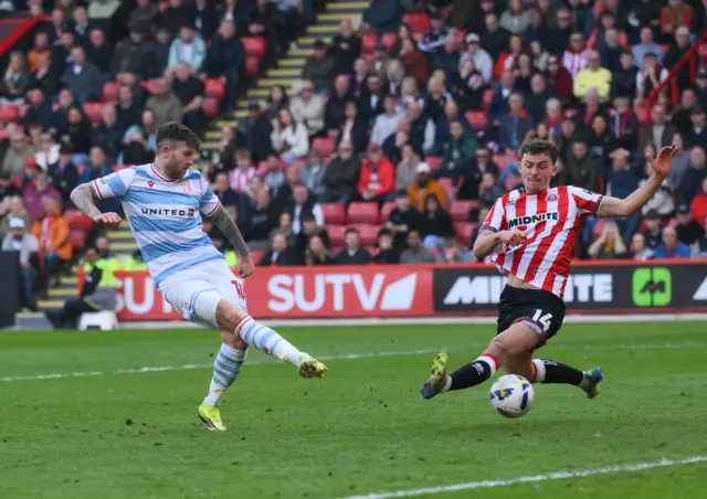 Josh Windass of Wrexham scores their first goal