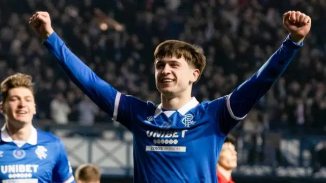 Rangers' Mikey Moore celebrates