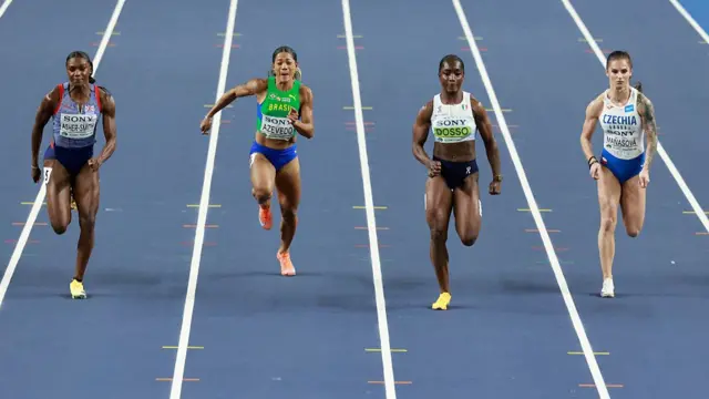 Britain's Dina Asher-Smith (L), Brazil's Ana Azevedo, Italy's Zaynab Dosso and Czech Republic's Karolína Maasová (R) compete