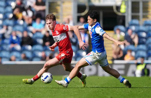Middlesbrough's Tommy Conway and Blackburn Rovers' Ryoya Morishita (right) battle for the ball
