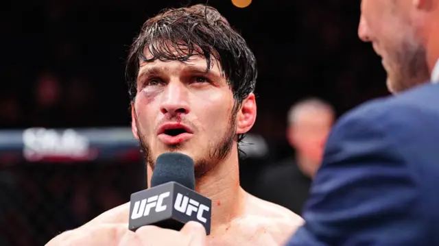 Mosvar Evloev speaks on a UFC mic