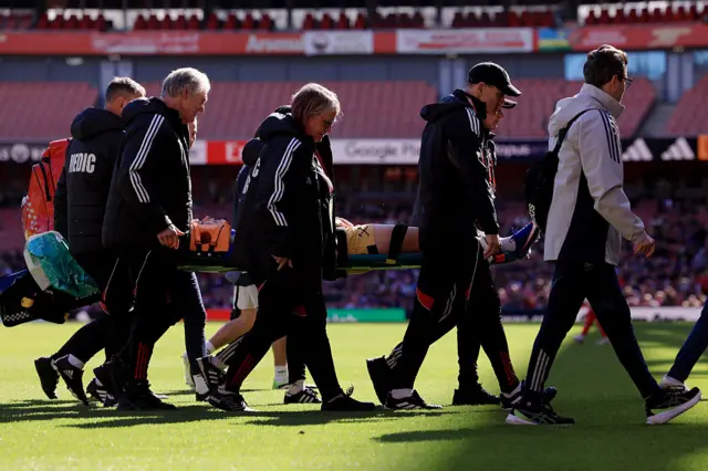 Eva Nystrom stretchered off