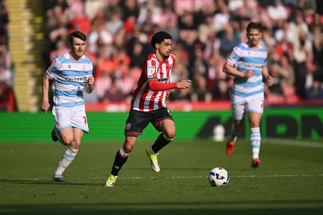 Ki-Jana Hoever of Sheffield United runs with the ball
