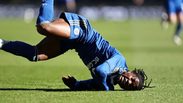 Abdul Fatawu of Leicester City is brought down