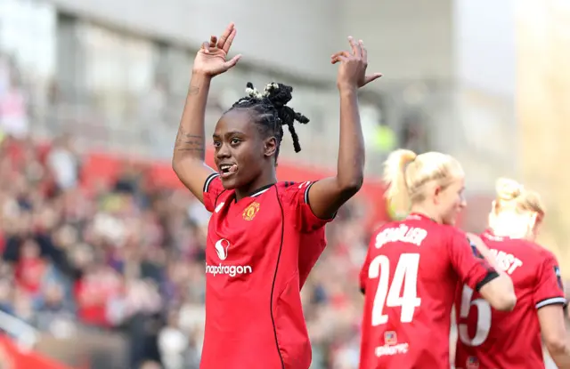 Melvine Malard of Manchester United celebrates