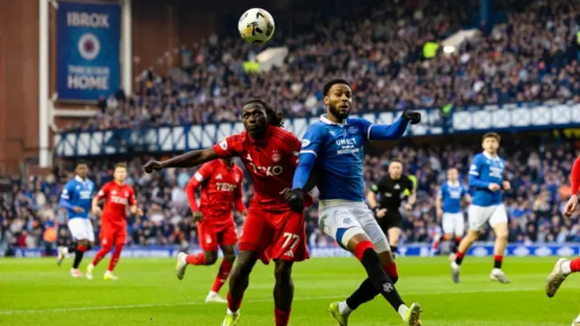 Aberdeen's Emmanuel Gyamfi and Rangers' Youssef Chermiti