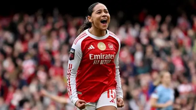 Olivia Smith of Arsenal celebrates scoring her team's first goal