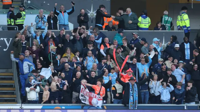 Swansea fans celebrate at the Swansea.com Stadium
