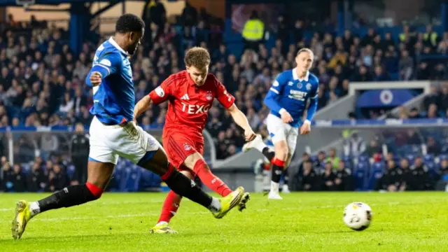 Dennis Geiger scores for Aberdeen against Rangers