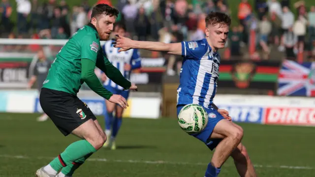 Action from Glentoran v Coleraine