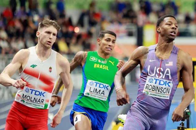 Hungary's Attila Molnar (L), Brazil's Matheus Lima and USA's Chris Robinson