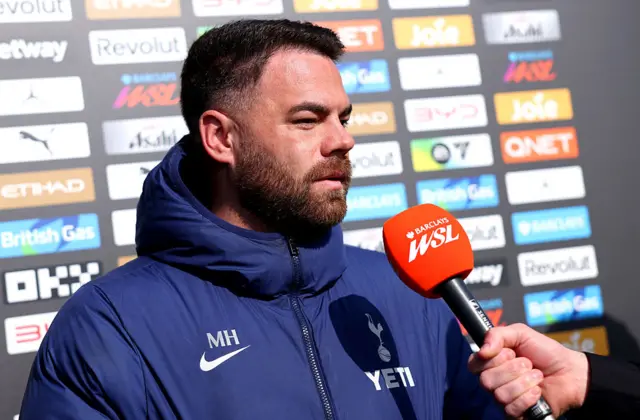 Martin Ho, Manager of Tottenham Hotspur, speaks to the media