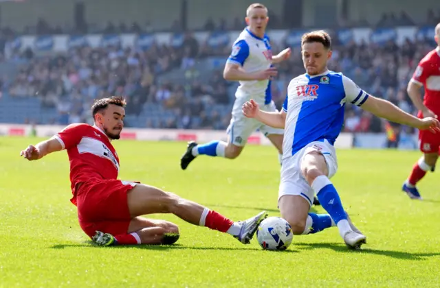 Middlesbrough's David Strelec and Blackburn Rovers' Sean McLoughlin (right) battle for the ball