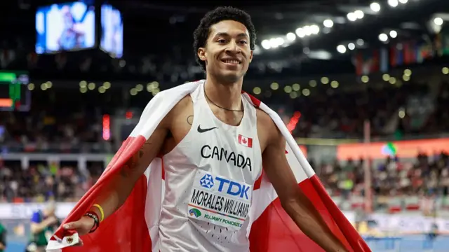 Christopher Morales Williams celebrates
