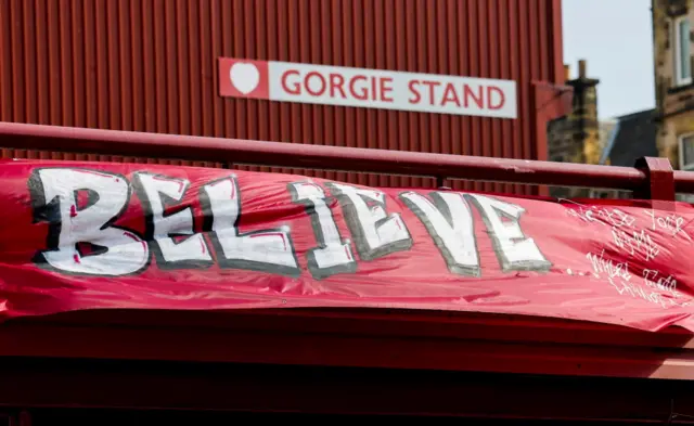 A banner outside Tynecastle