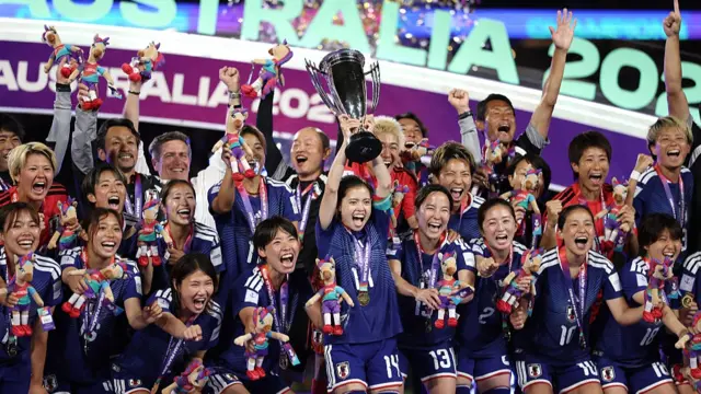 Japan players celebrate