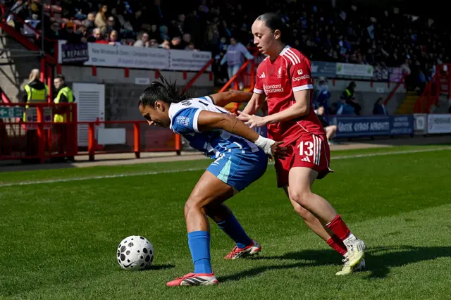 Manuela Vanegas shields the ball
