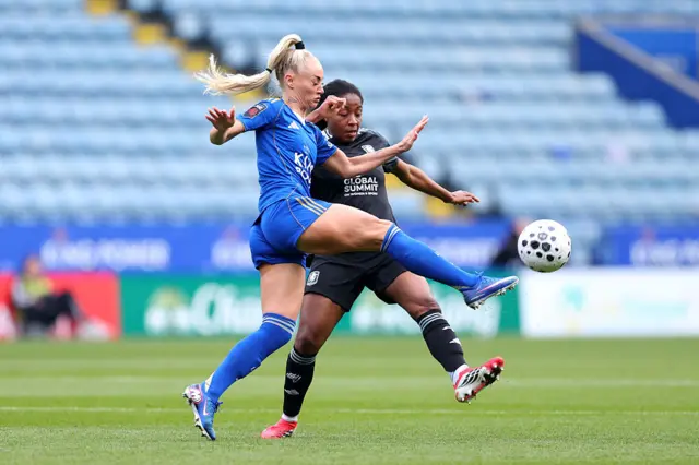 Alisha Lehmann of Leicester City is challenged by Oriane Jean-Francois
