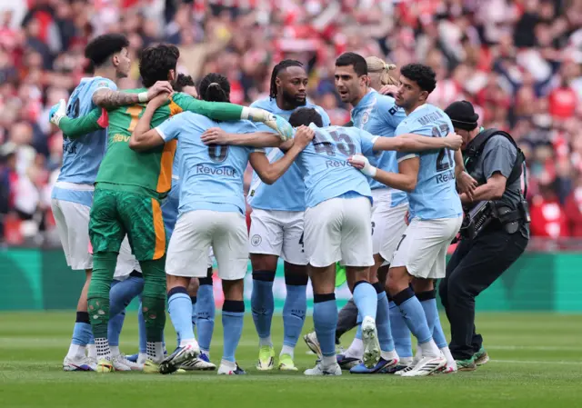 Man City huddle
