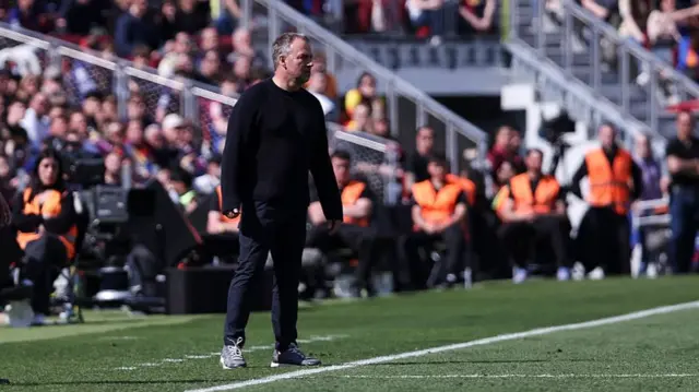 Hansi Flick, head coach of FC Barcelona, looks on