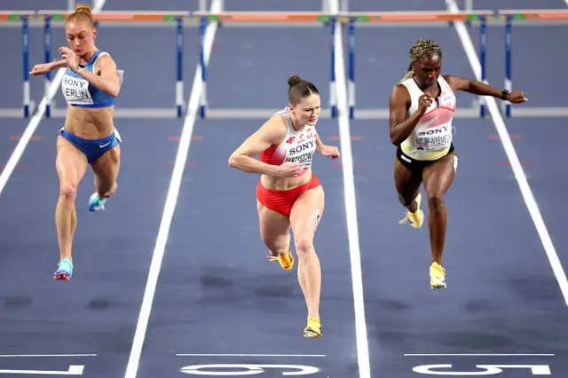 Pia Skrzyszowska of Team Poland crosses the finish line