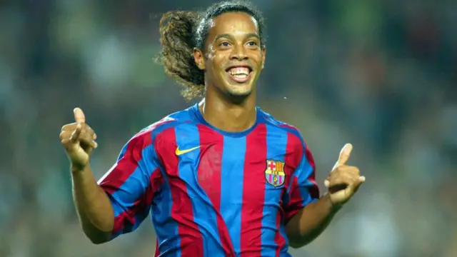 : Ronaldinho of FC Barcelona celebrates his goal