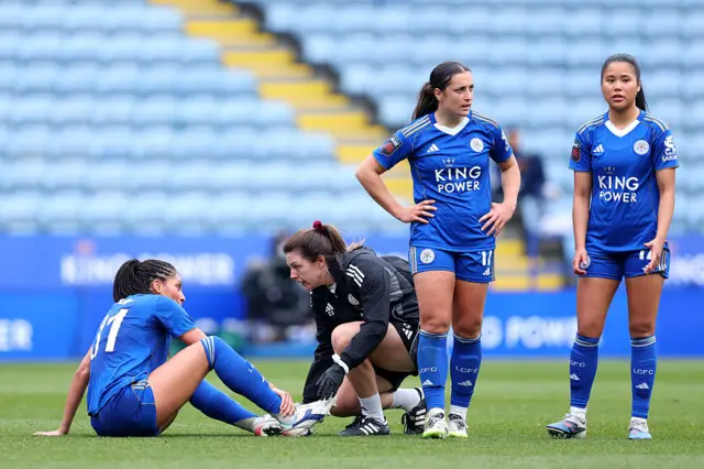 Chantelle Swaby of Leicester City receives medical treatment