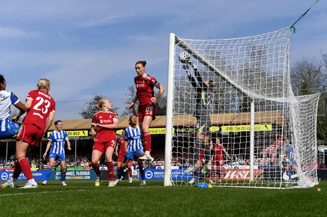 Falk saves from under her own bar
