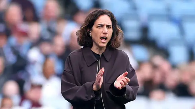 Natalia Arroyo, Manager of Aston Villa, applauds