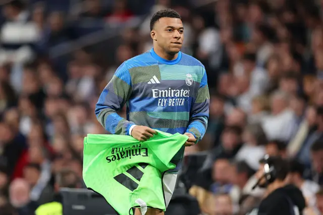 Kylian Mbappe of Real Madrid warms up