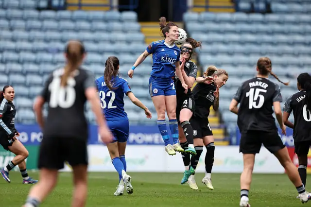 Shannon O'Brien of Leicester City Women in action with Anna Patten of Aston Villa Women