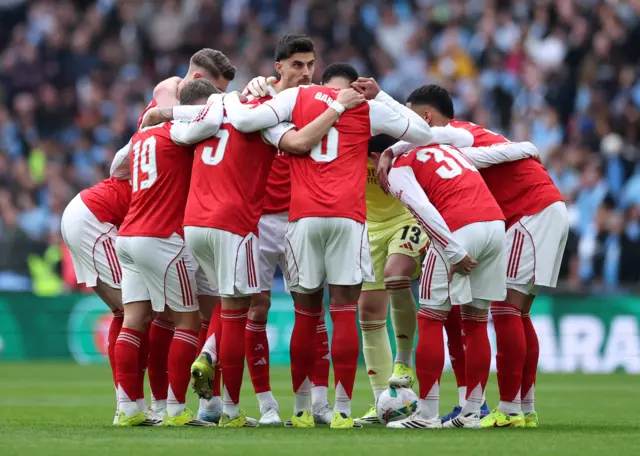 Arsenal huddle