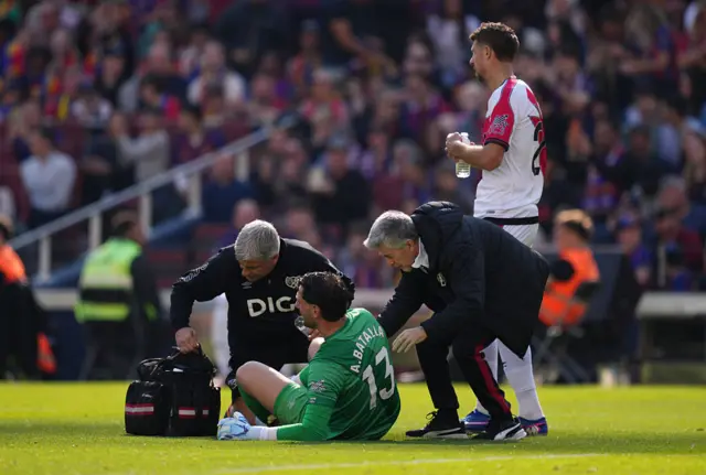 Augusto Batalla of Rayo Vallecano receives medical treatment