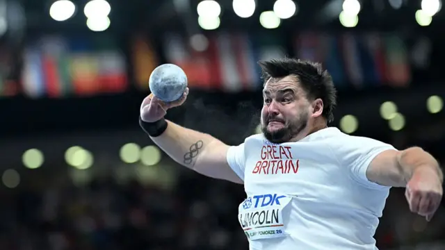 Scott Lincoln competes in the men's shot put final